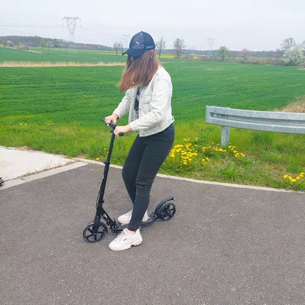 2de kansje Kruzzel hyperion step voor volwassenen met vering en schijfremmen tot 100kg - opvouwbaar - grote wielen - ideaal voor the last mile - zwart