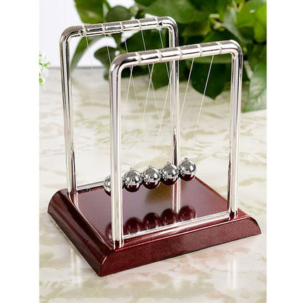 Newton pendel balance ballen bordeaux voet