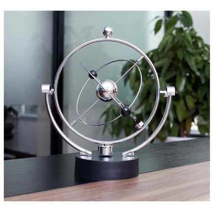 Newton cradle pendel balance magnetisch zonnestelsel